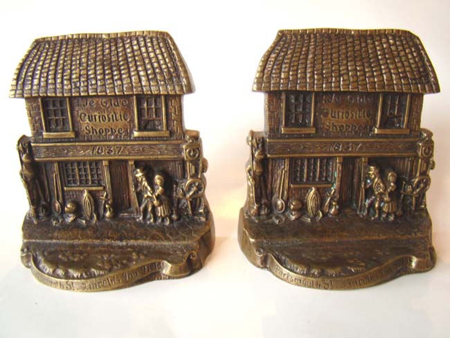 A charming pair of antique bronze bookends depicting Charles Dickens' "Old Curiosity Shoppe" — image 2